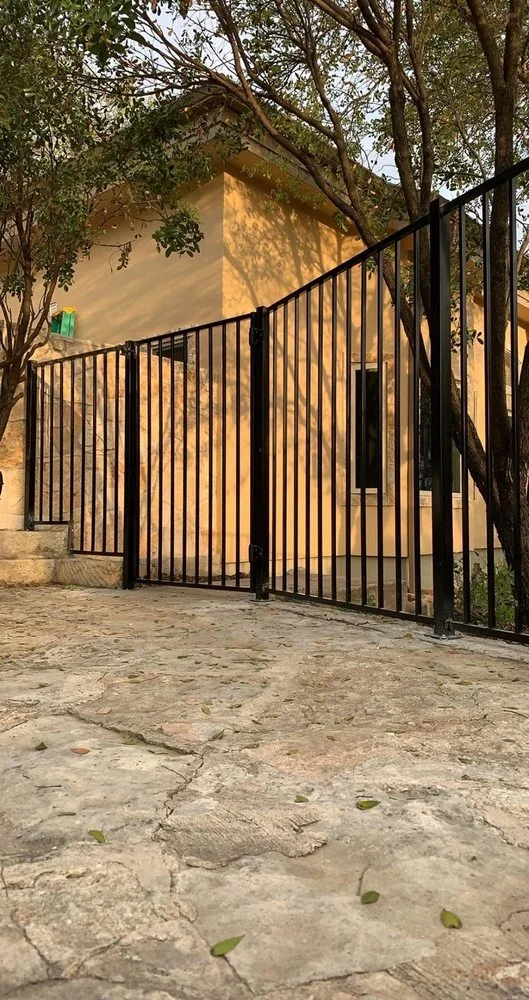 Ornamental steel fence built by Love and Lumber